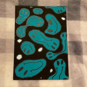 Melted smiley painting